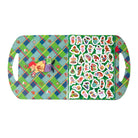 A rectangular holiday-themed tray or serving board with integrated side handles, featuring a green and blue argyle pattern on one side and a sheet of colorful Christmas-themed stickers on the other.
