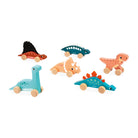 Set of colorful dinosaur toys on a white background