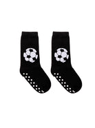 Black socks with soccer ball design and non-slip dots on a white background