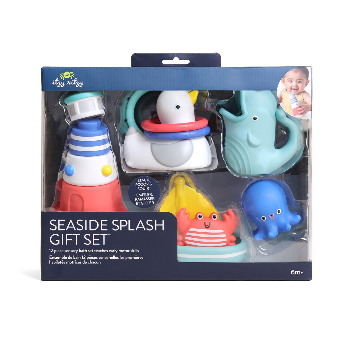A boxed baby sensory bath set labeled 'Seaside Splash Gift Set' by Kula Mula. The packaging shows six colorful toy bath items inside a dark blue retail box: a striped tower, a white-and-red ring toy, a mint-green teapot, a yellow-and-red crab, a blue octopus, and a small round item.