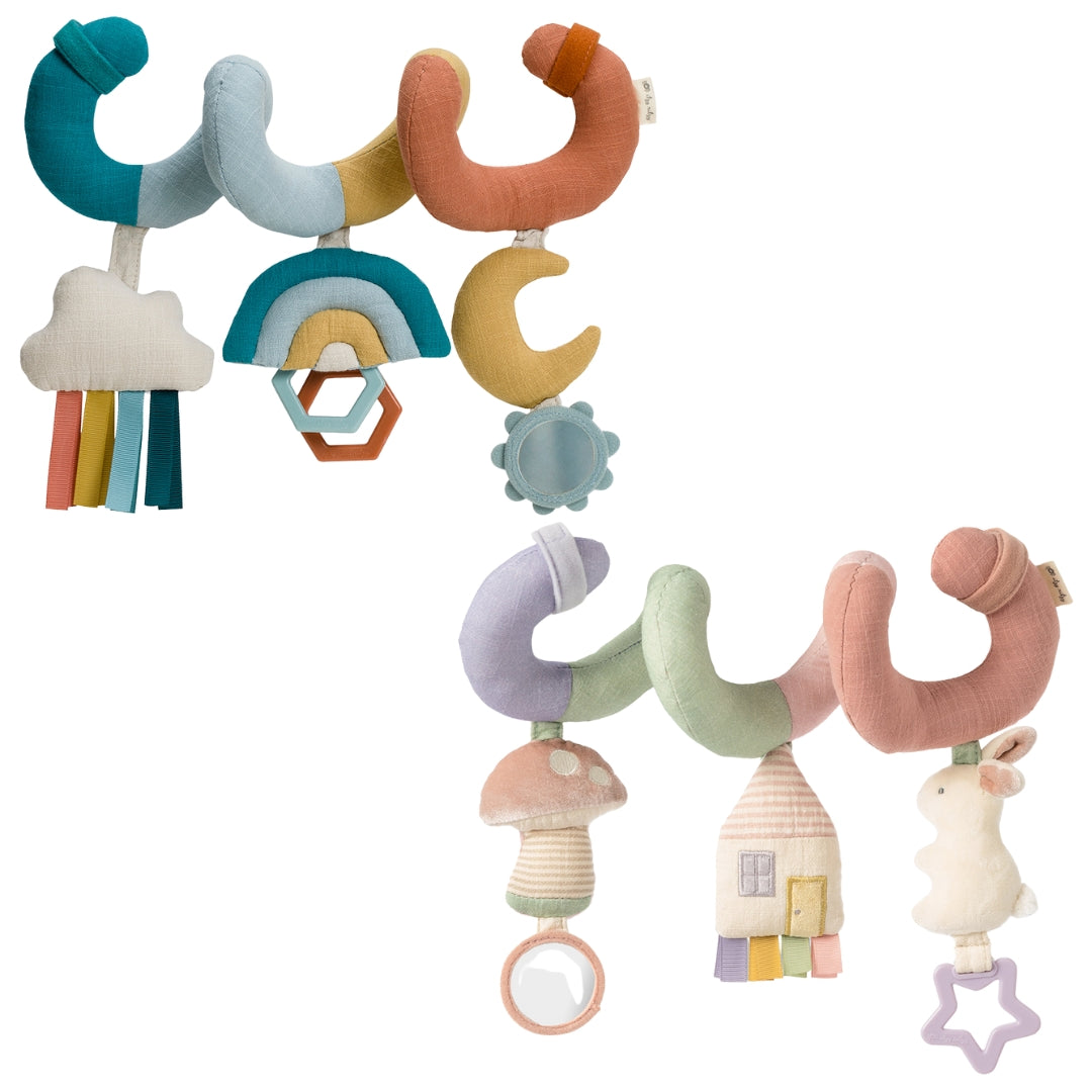 Colorful baby mobile with various shapes and textures on a white background