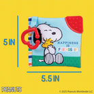 Snoopy and Woodstock soft book with red handle on a yellow background, featuring 'Happiness is Friendship' text.