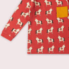 Red pajama set with unicorn pattern on a white background