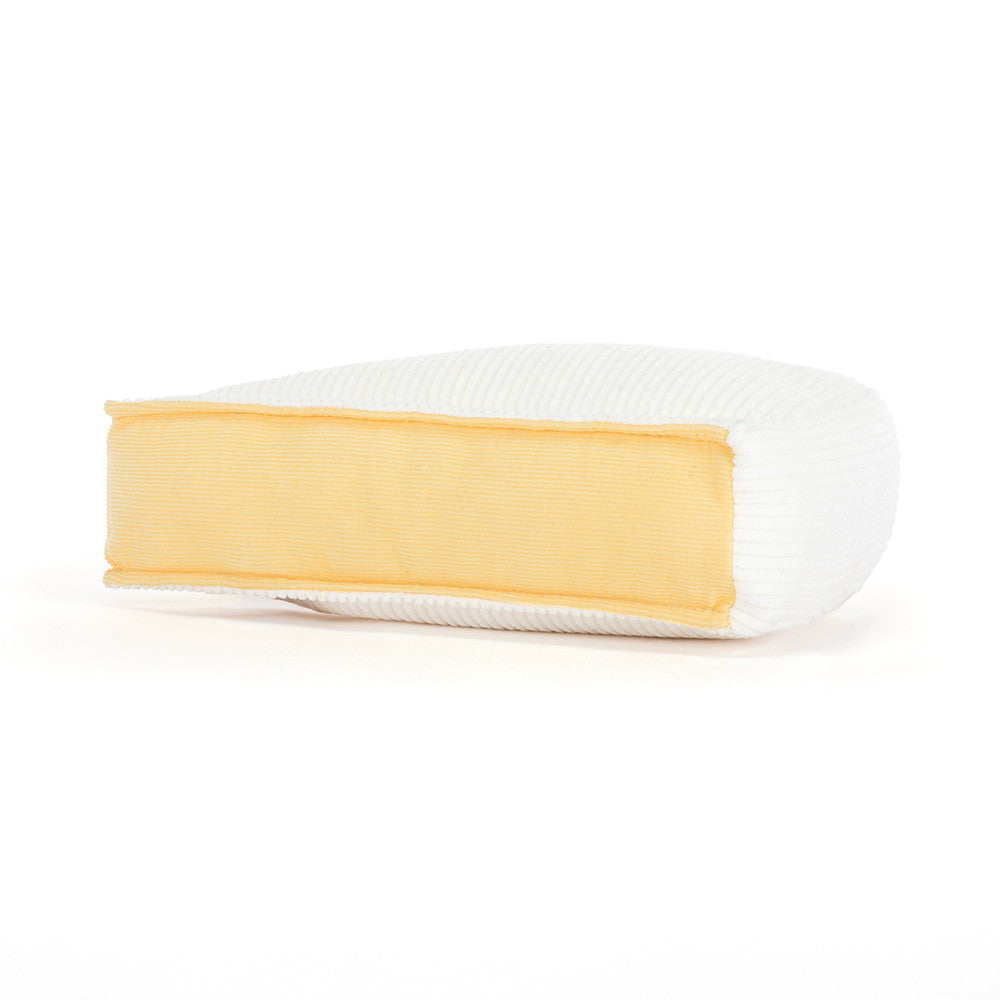 White rectangular object with a yellow strip on a white background