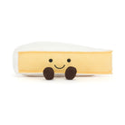 Plush toy resembling a piece of bread with a smiley face on a white background