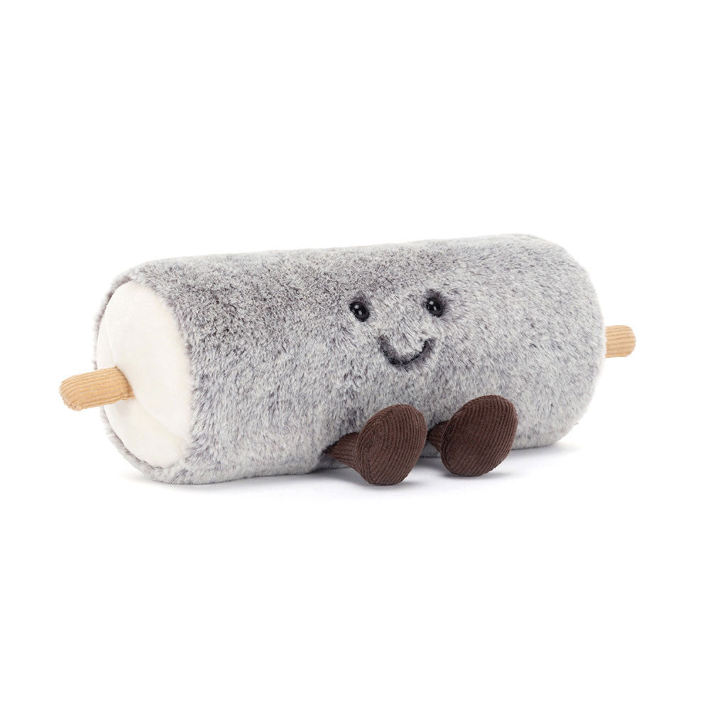 Plush toy resembling a rolling pin with a smiling face on a white background