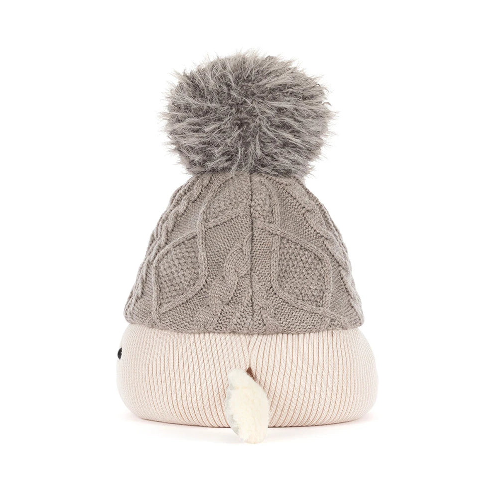 A baby knit pom-pom beanie hat featuring a textured gray cable-knit top section with a fluffy gray pom-pom, and a soft ribbed cream-colored bottom section with a small white faux-fur accent.
