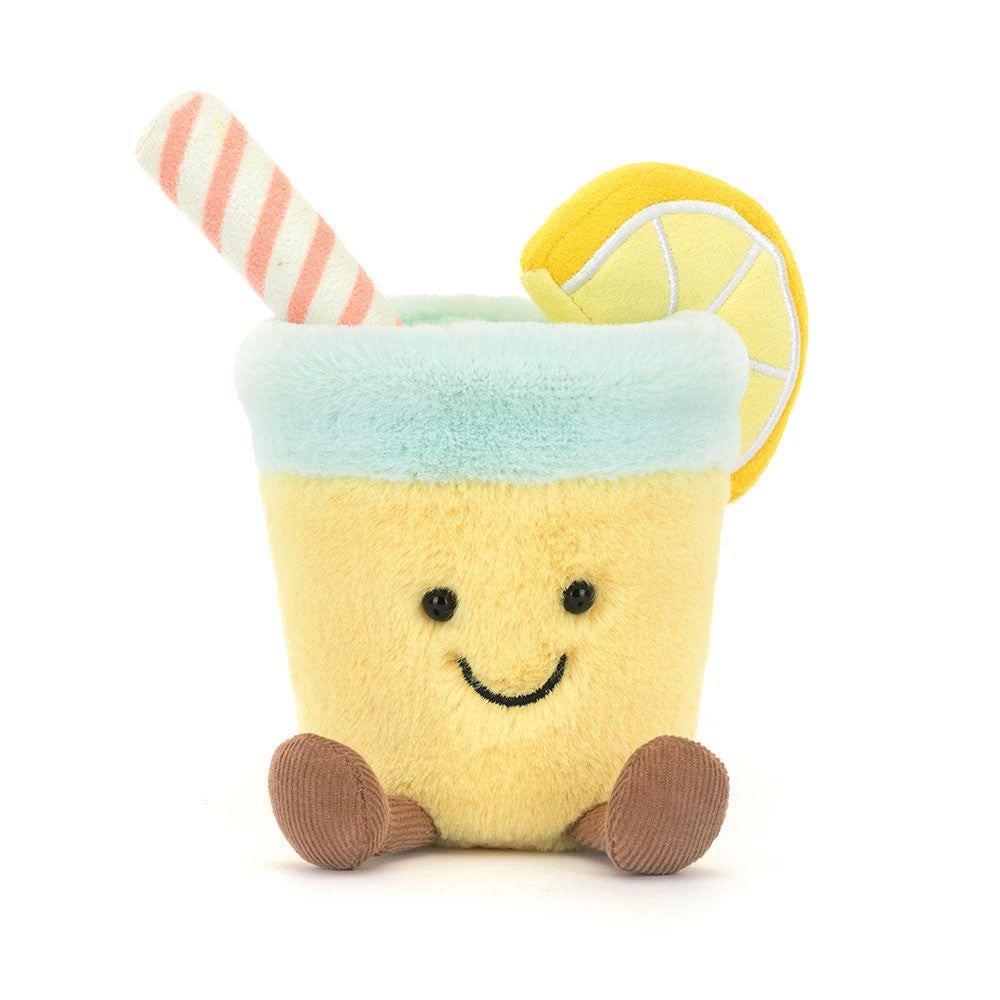A plush toy resembling a glass of lemonade with a lemon slice and a straw, smiling face at the bottom.