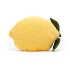 Plush lemon toy with green leaf on a white background