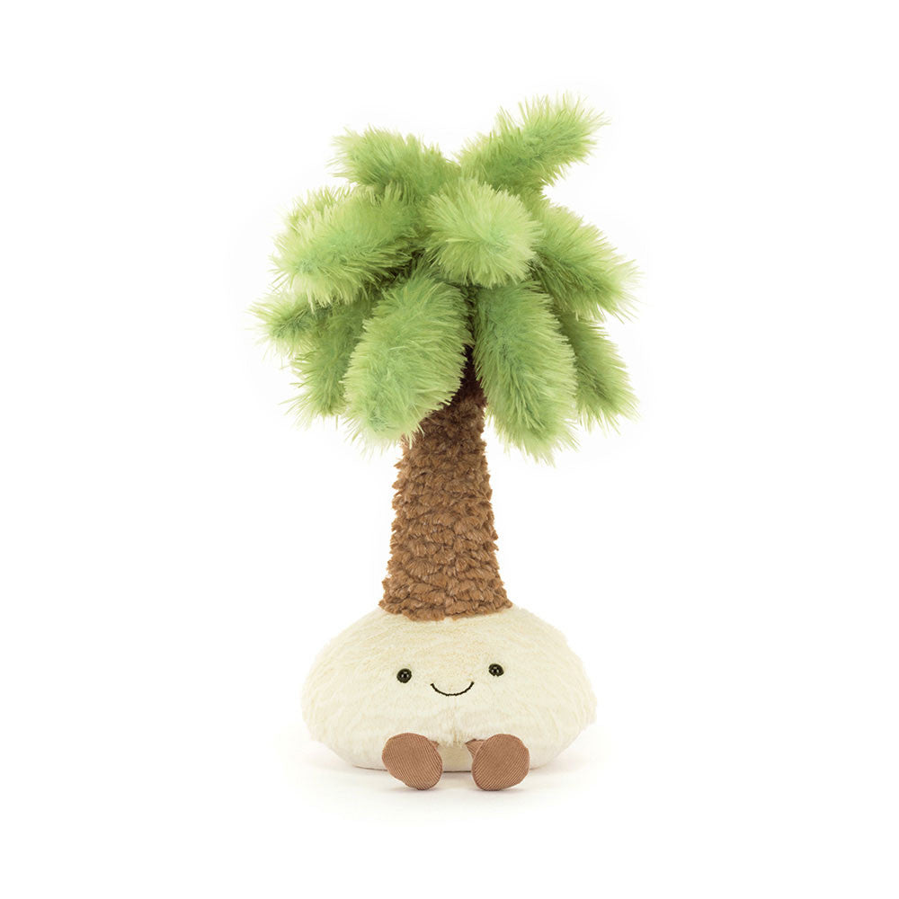 A plush palm tree toy with a smiling face, green fronds, and a white base.