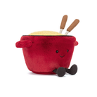 Red plush pot with a face, steam, and wooden spoons on a white background