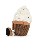 A plush cupcake toy with fluffy white faux-cream frosting, brown knit wrapper, and a small brown boot attached to the side, photographed on a clean white background.