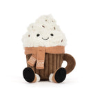 A plush cupcake toy with fluffy white frosting, a brown cupcake base, and a tan knit scarf, photographed on a clean white background.
