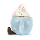 Plush toy of a cat in a blue mug with snowflake details on a white background