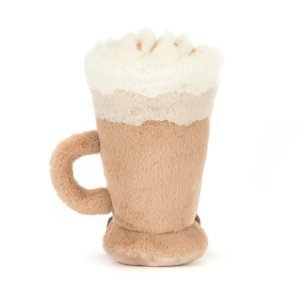 Plush toy resembling a mug with cream on top on a white background