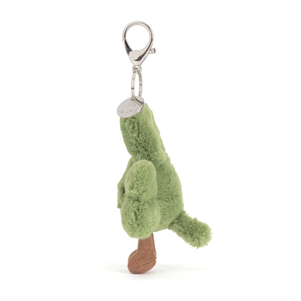 Green plush frog keychain on a white background