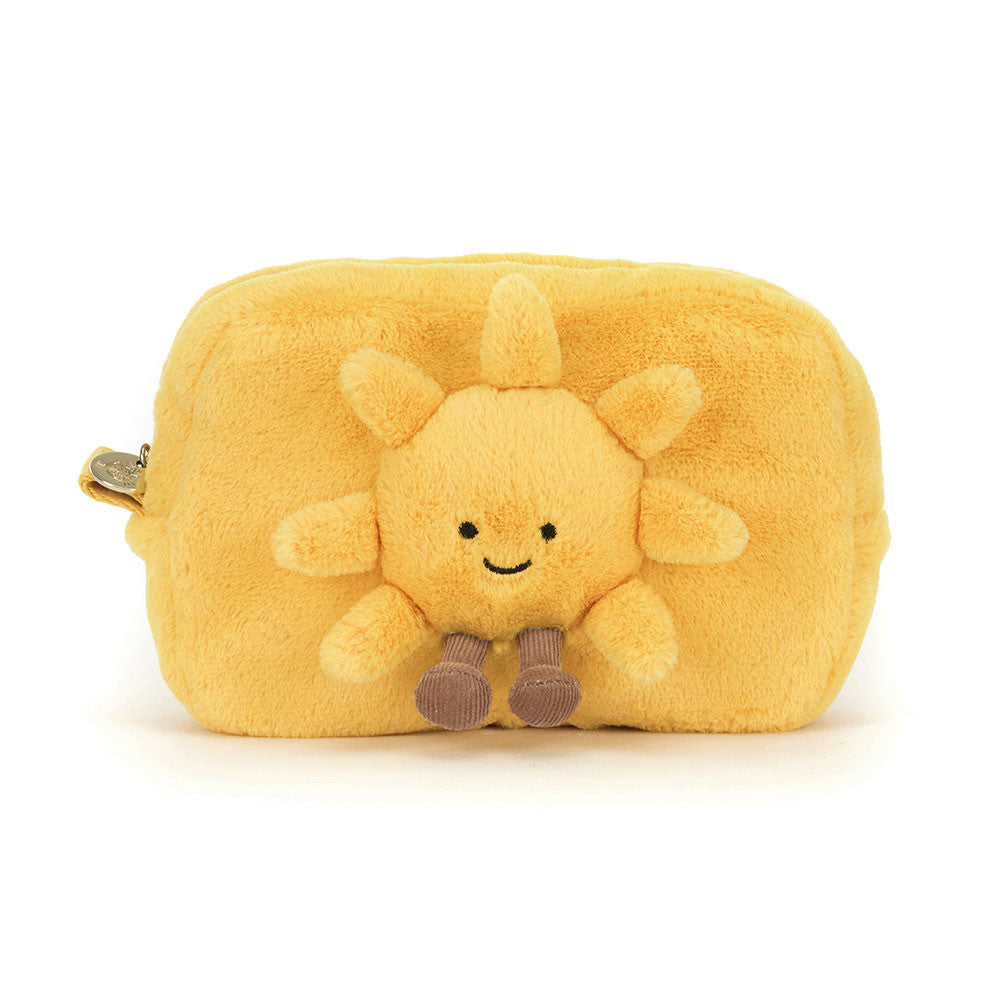 Yellow plush sun-shaped pouch with a smiling face on a white background