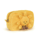 Yellow plush sun-shaped pouch with a smiling sun face on a white background