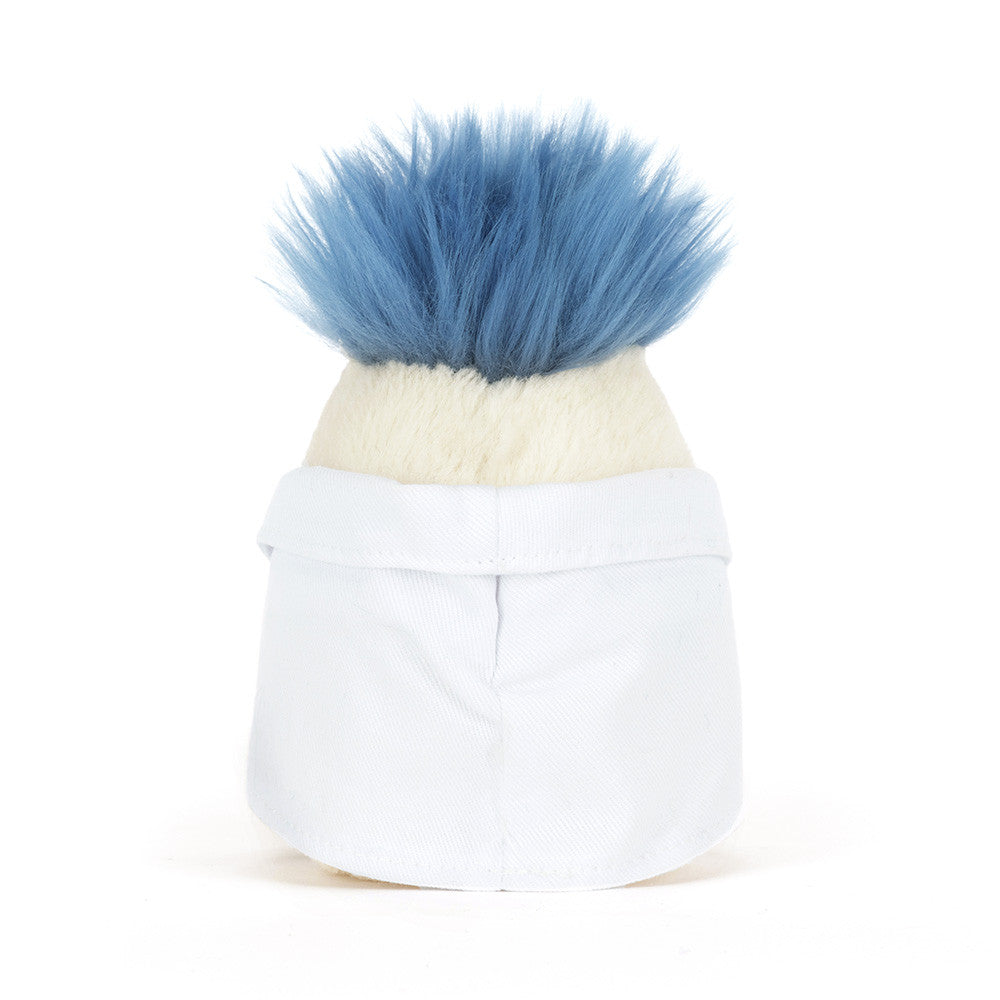 Small plush toy with blue fur on a white background