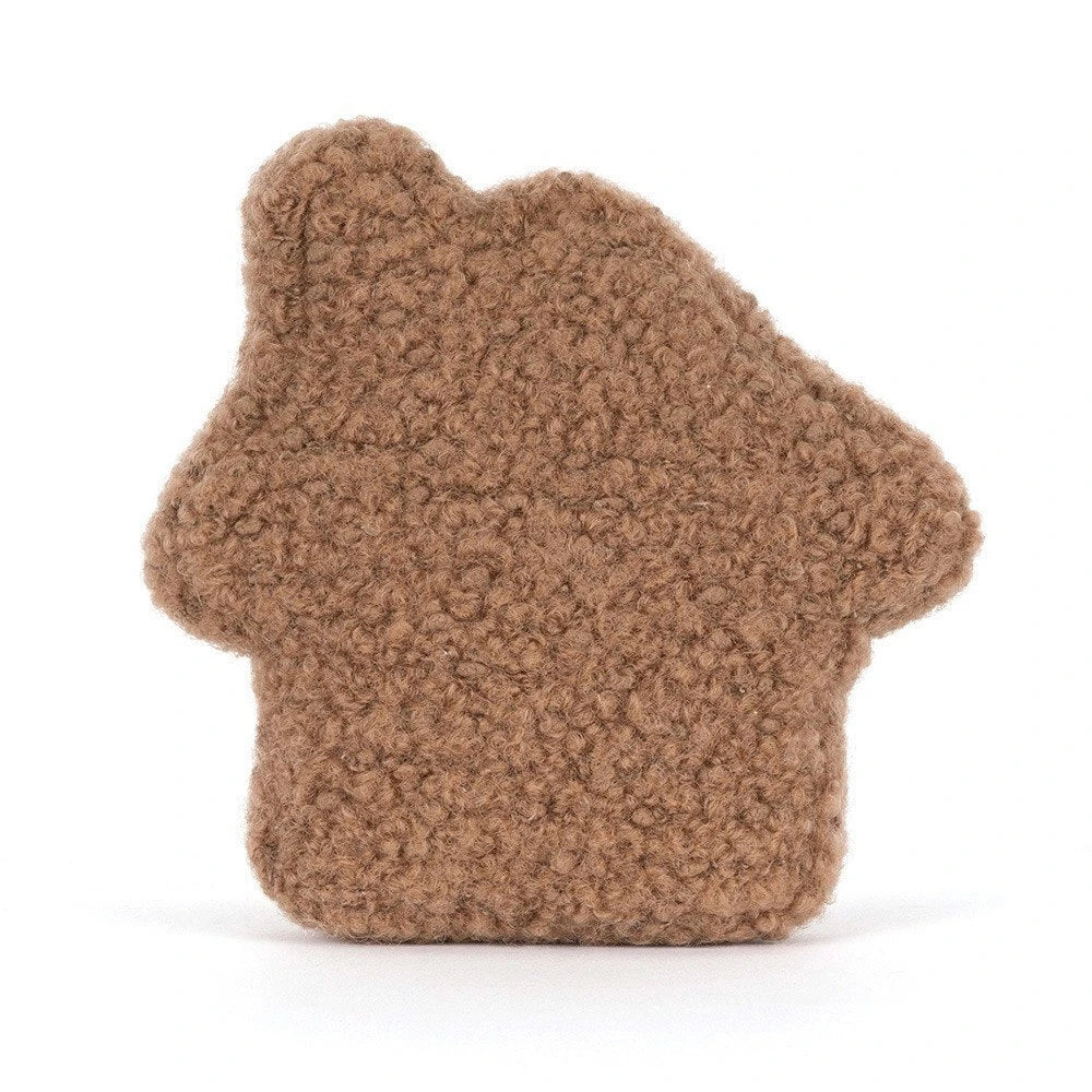 A brown textured plush toy shaped like a fox or animal character, shown from the side on a clean white background. 