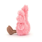 Pink plush bunny toy on a white background