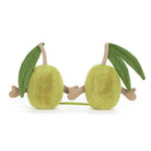Plush toy shaped like a lime with green leaves on a white background
