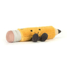Plush toy shaped like a pencil with a smiling face on a white background