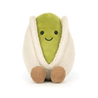 Plush toy shaped like a pistachio with a smiling face on a white background