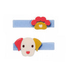 Colorful dog-shaped hair clip on a white background