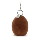 Brown fluffy keychain with a silver tag on a white background