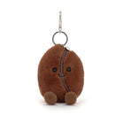 Plush keychain shaped like a coffee bean with a face on a white background
