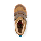 A top-down view of a toddler's high-top shoe in tan and brown, featuring two hook-and-loop straps with teal accents, a tan outsole, and a visible 'see kai run' logo on the insole.
