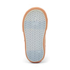 The bottom sole of a shoe, showing a light blue and white chevron tread pattern with a peach-colored edge, photographed on a white background.
