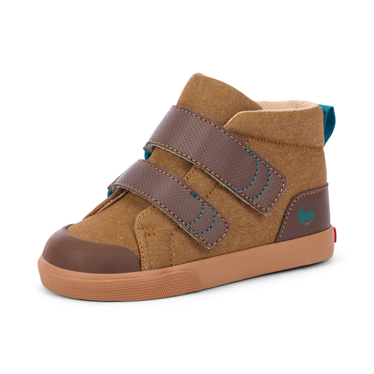 A toddler's mid-height canvas sneaker in brown and tan, featuring two brown hook-and-loop straps with blue stitching, a brown rubber toe cap, and a tan sole, shown against a plain white background.