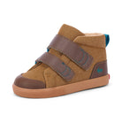 A toddler's mid-height canvas sneaker in brown and tan, featuring two brown hook-and-loop straps with blue stitching, a brown rubber toe cap, and a tan sole, shown against a plain white background.