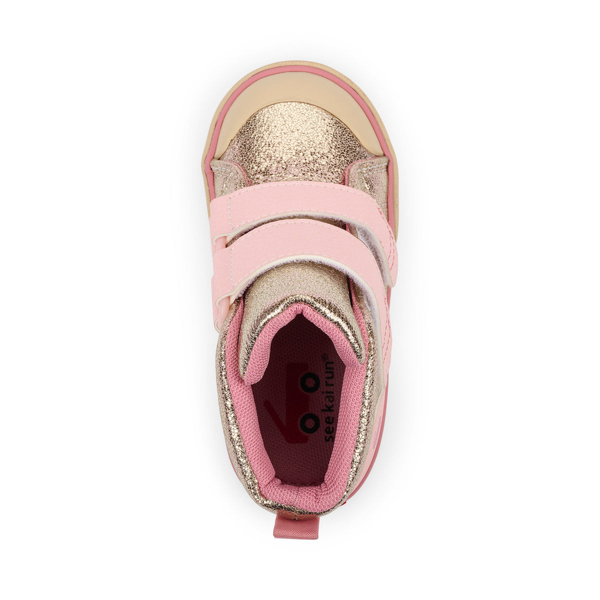 Pink and gold children's shoe on a white background