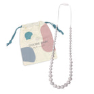 Beaded necklace with a drawstring bag featuring 'Goobie Baby' branding on a white background.