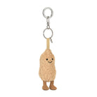 A  plush peanut-shaped keychain with a smiling face, textured beige body, brown feet.