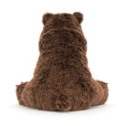 A brown plush teddy bear toy shown from the back, sitting down, on a clean white background.