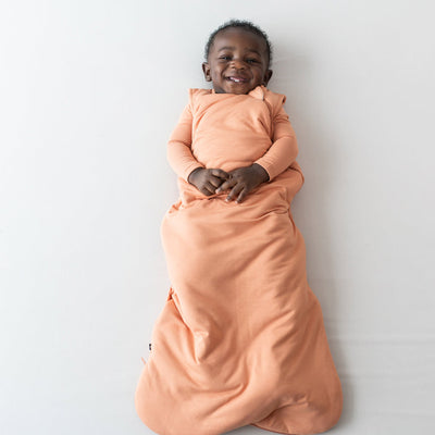 Solid Sleep Bag Tog 1.0 - Apricot by Kyte Baby