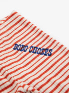 Red and white striped fabric with 'BOBO CHoses' branding on a white background