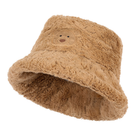 Brown teddy bear hat on a white background
