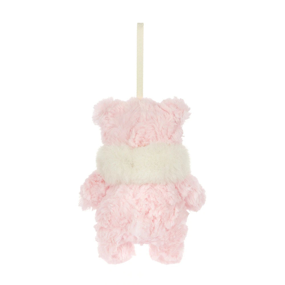 A small plush teddy bear ornament in soft pink curly fabric with a fluffy cream band around the middle and a cream hanging ribbon, shown on a plain white background.