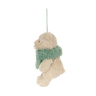 A plush teddy bear hanging ornament in cream-colored faux fur with a fuzzy mint green scarf, suspended by a thin green string against a plain white background.