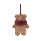 A plush Christmas stocking ornament shaped like a teddy bear wearing a burgundy faux-fur scarf, hanging by a thin black string against a plain white background.