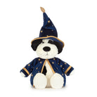 A plush dog toy dressed as a wizard, wearing a navy blue pointed hat and matching robe with gold star patterns and trim, on a plain white background.