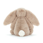 Fluffy beige bunny toy on a white background