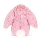 Pink plush bunny toy on a white background