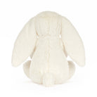 White plush bunny toy on a white background