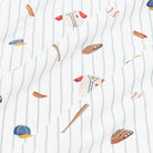 Baseball-themed pattern with jerseys, bats, and caps on a white background